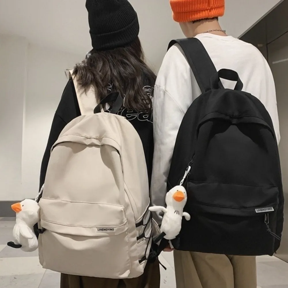 

Large Capacity Backpack Japanese Style Casual Look Students Schoolbag Multiple Pockets with Pendant Teenage Nylon Book Bag