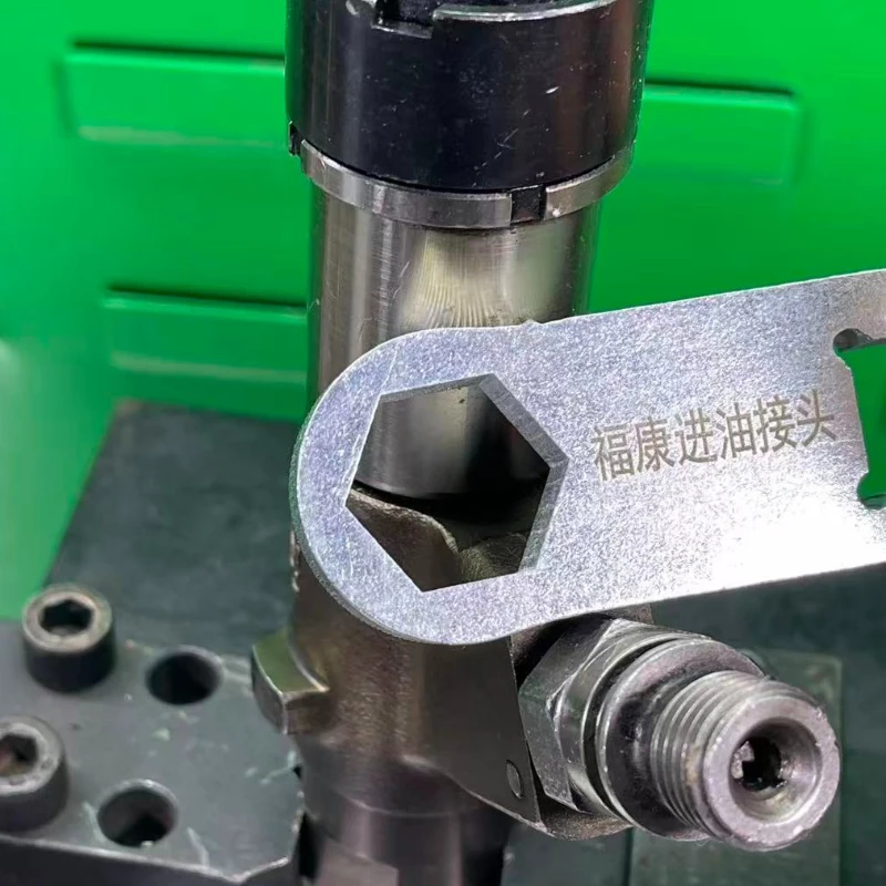 

Wrench for installing and removing screws for Cummins Injector oil inlet fittings