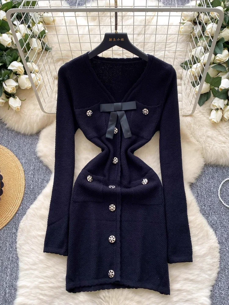 فساتين محبوكة جديدة للنساء بياقة على شكل V مع فيونكة حلوة تونك مزاجه رداء نسائي 2025 أزرار عتيقة من Vestidos De Mujer ​ فستان بوديكون