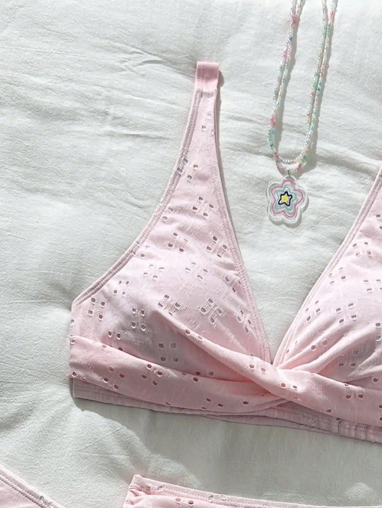 

Pink 3-Piece Eyelet Knit Swimsuit Set Featuring Crossed Front Top And Layered Mini Skirt With Side Bow