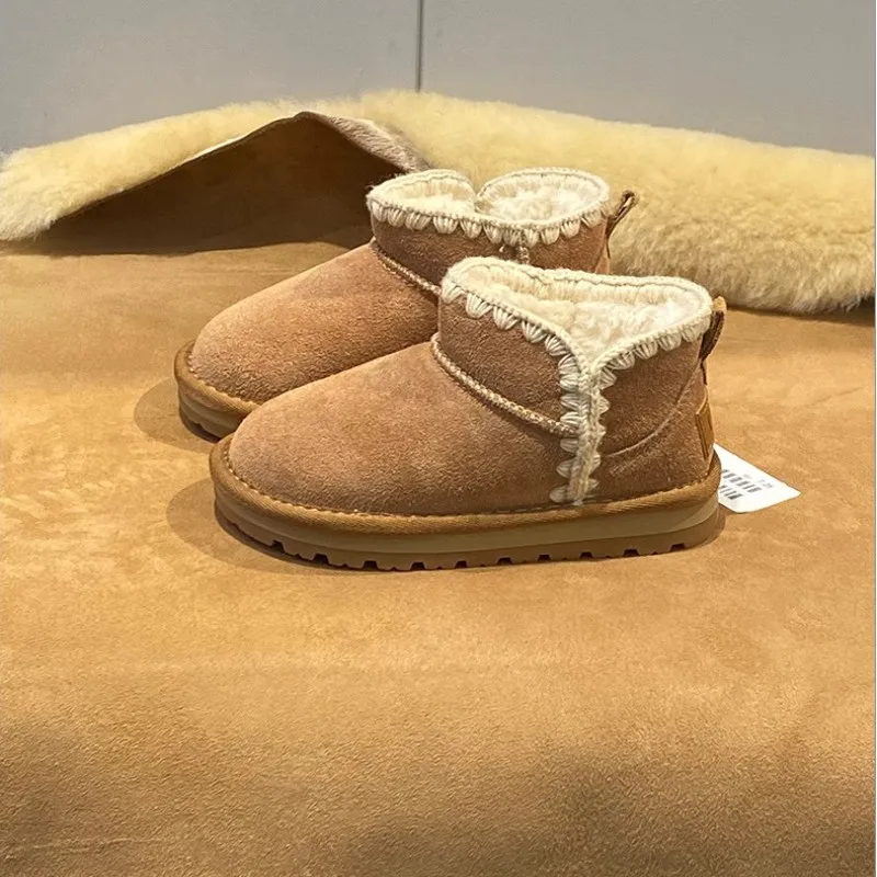 Luxury fashionable children's soft leather snow boots winter New girls' thick warm cotton boots Anti slip  baby short boots