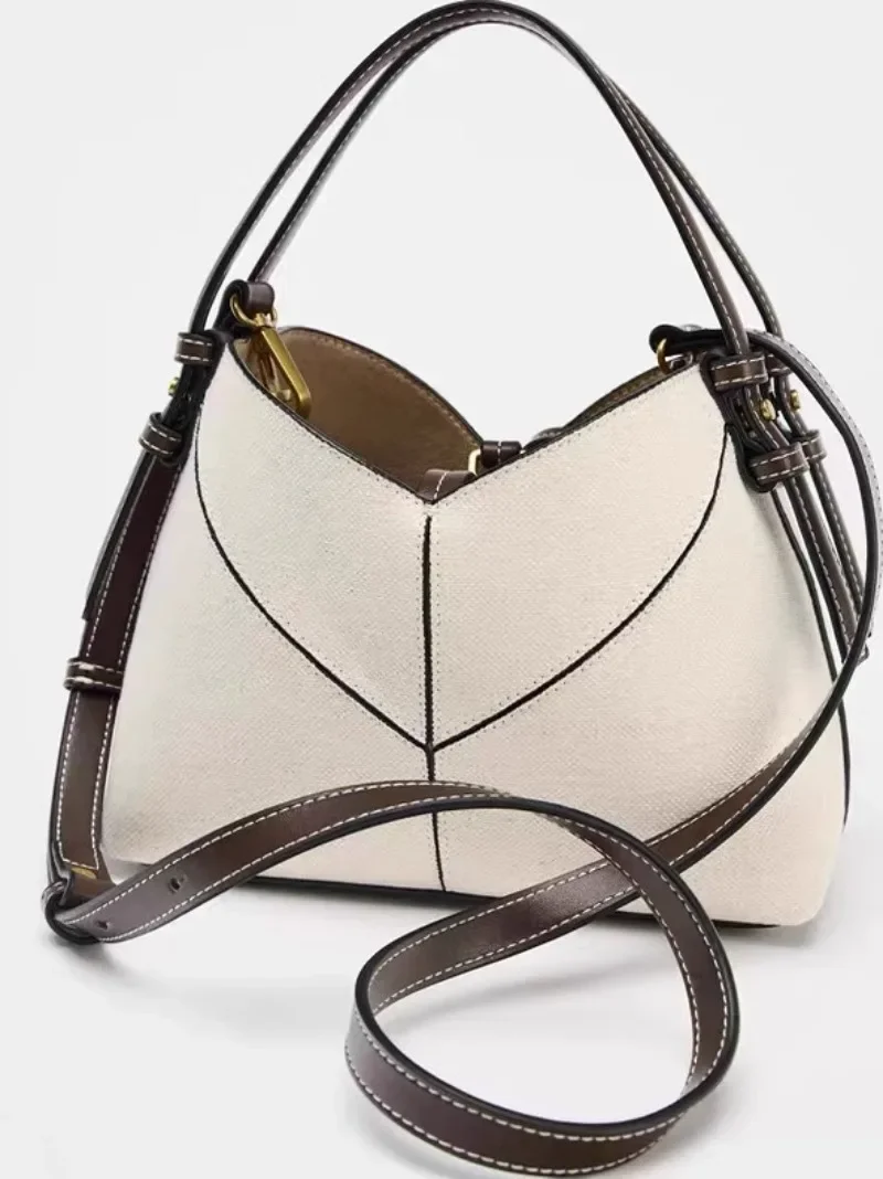 

2025 Fashion Versatile PU Canvas Bucket Shoulder and Crossbody Bags Simple Casual Sense of Luxury Retro Handbags for Women