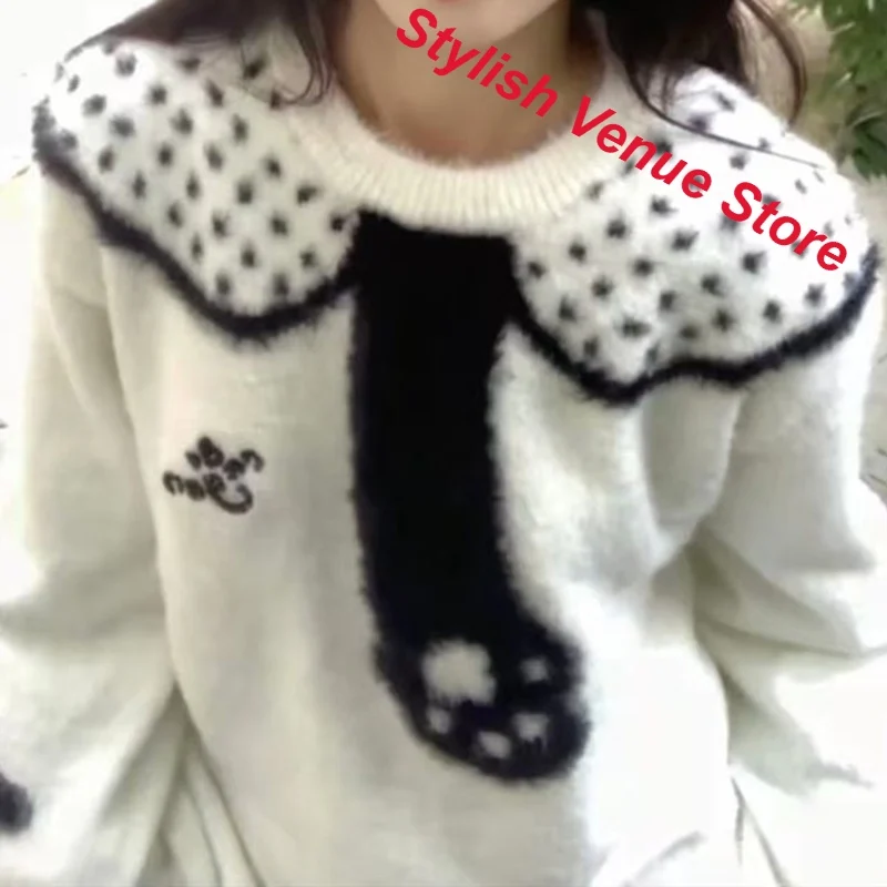 Korean version of college wind sweet and lovely cat claw jacquard pullover women's autumn and winter new loose warm casual top.