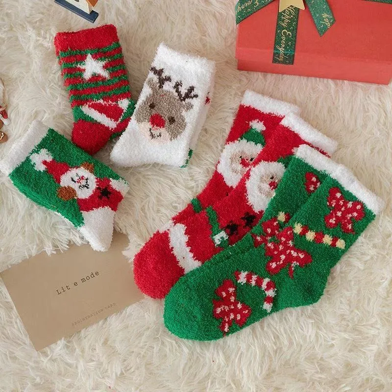 3 pairs of randomly colored, women’s coral velvet Christmas socks.