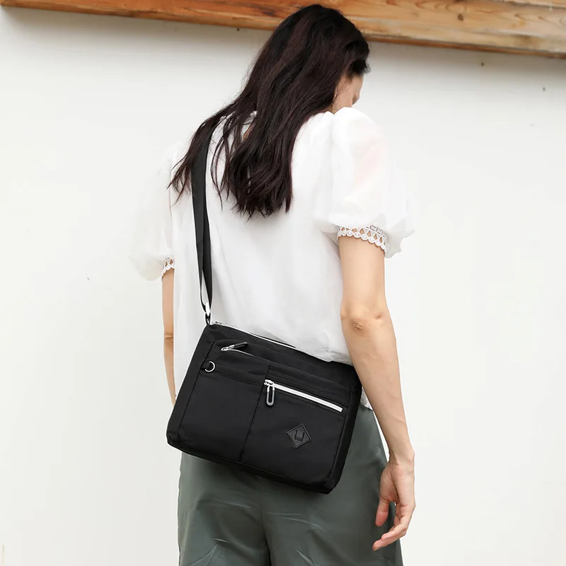 

Casual Travel Commuting Simple Waterproof Messenger Cross Body Ladies Handbag Shoulder Bag Womens Large Purse