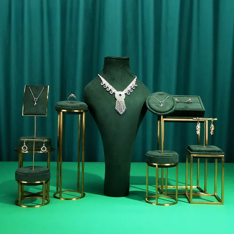 

Green high-end jewelry display stand in the window, metal jewelry props, necklace earrings, jewelry display stand set