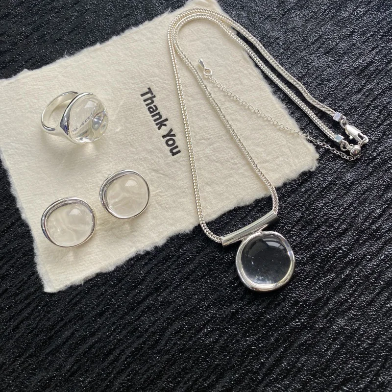 

2025 Fashion Jewelry Abnormal White Crystal Pendant Necklace Earring Ring Set