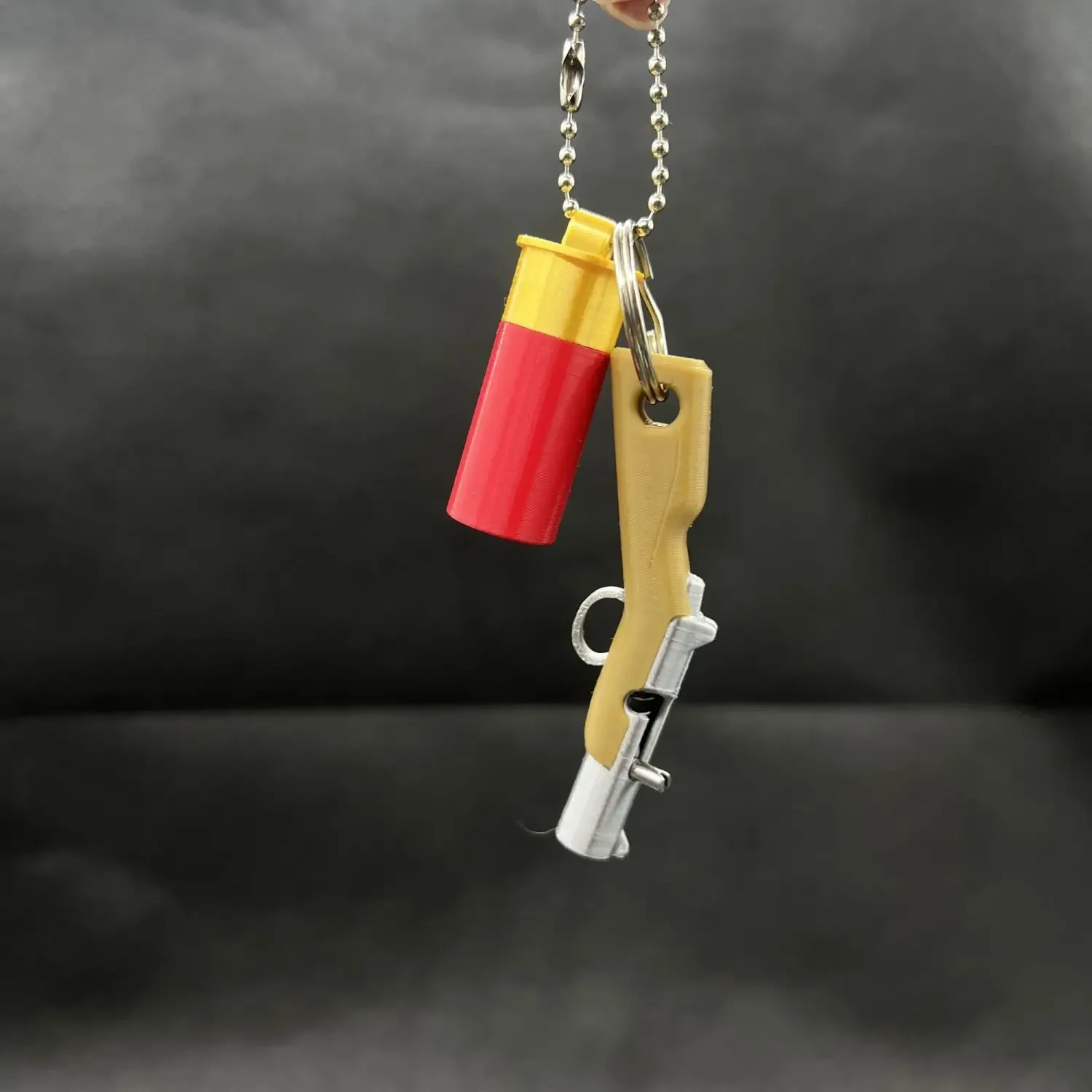 3D-geprinte sleutelhanger kan kleine ballen vuur Mini Soft Bullet Gun Speelgoed Rugzakhanger