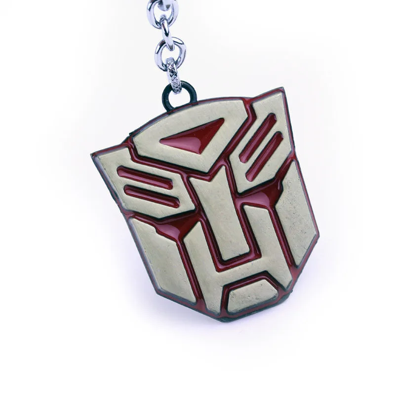 Cartoon Transformers Peripheral Optimus Prime Logo Mad Autobots Brelok do kluczy Breloki Wisiorek Prezent urodzinowy Cosplay Rekwizyty Biżuteria