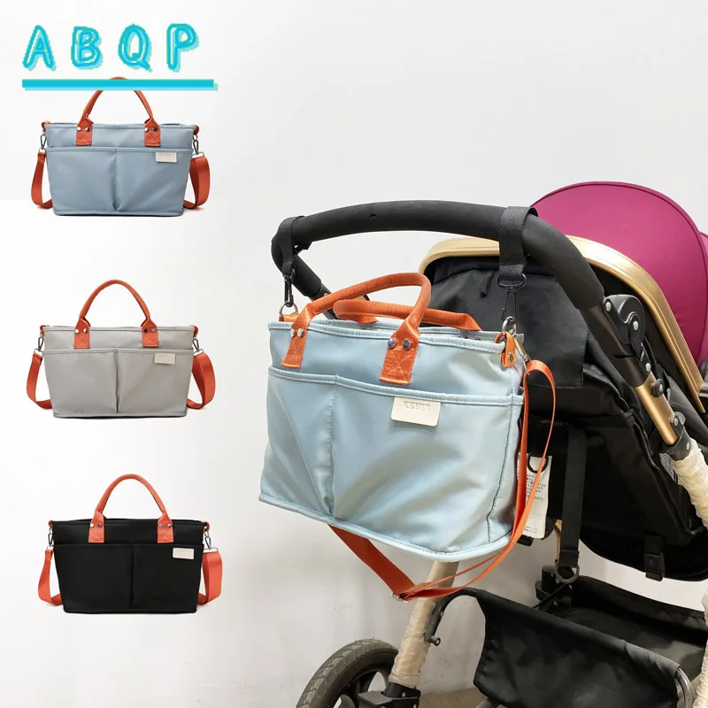 new-baby-stroller-hanging-bag-multifunctional-baby-bag-large-capacity-fashionable-and-portable-baby-diaper-storage-bag