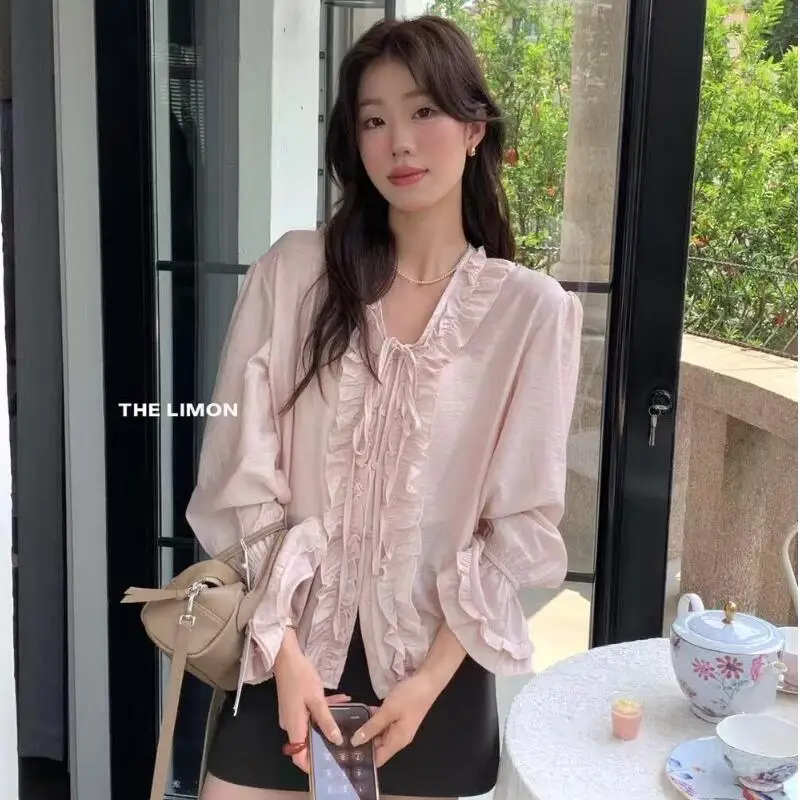

Early Spring Korean Versatile V-Neck Women's Lace Up Edge Slim Fit Trumpet Sleeve Temperament Solid Color Long Sleeve Shirt Top