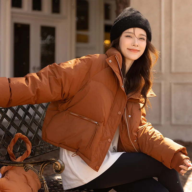 Winter Frauen Daunen mäntel Mode lässig Luxus feste Farbe Stehkragen Reiß verschluss Knopf doppelte Knopfleiste wind dichte warme kurze Jacke