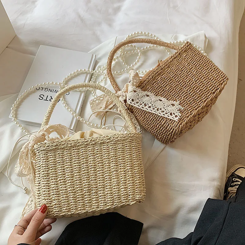 Neue Perle Strohs ack Sommer hand gewebte Umhängetasche weibliche gewebte Korb Frauen Handtasche Strand Damen Reise Umhängetaschen