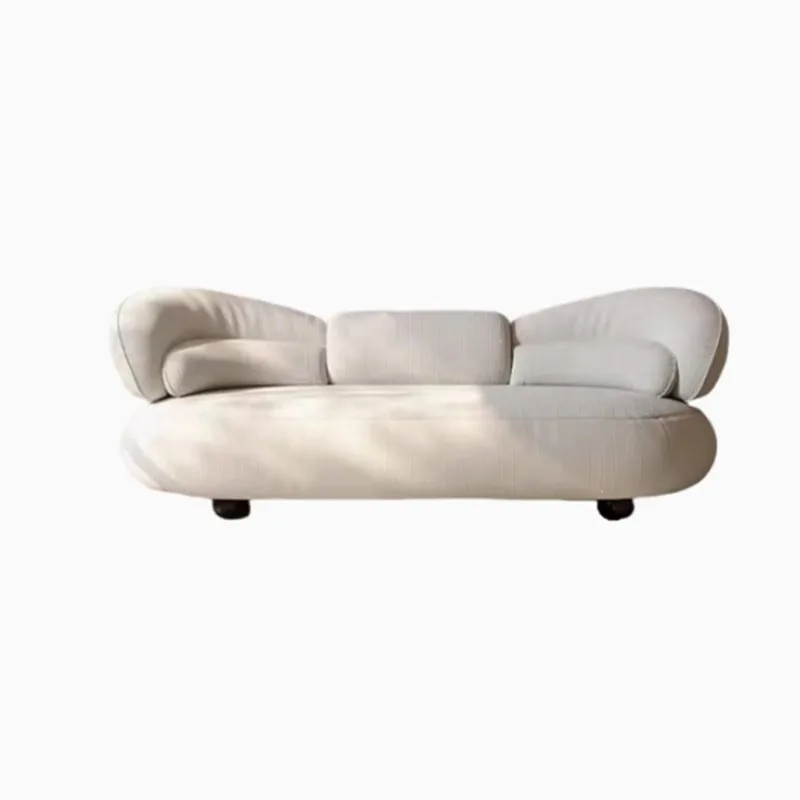 Italian creativity, light luxury high-end, curved sofa, minimalist and uniquely shaped cream style in the living room