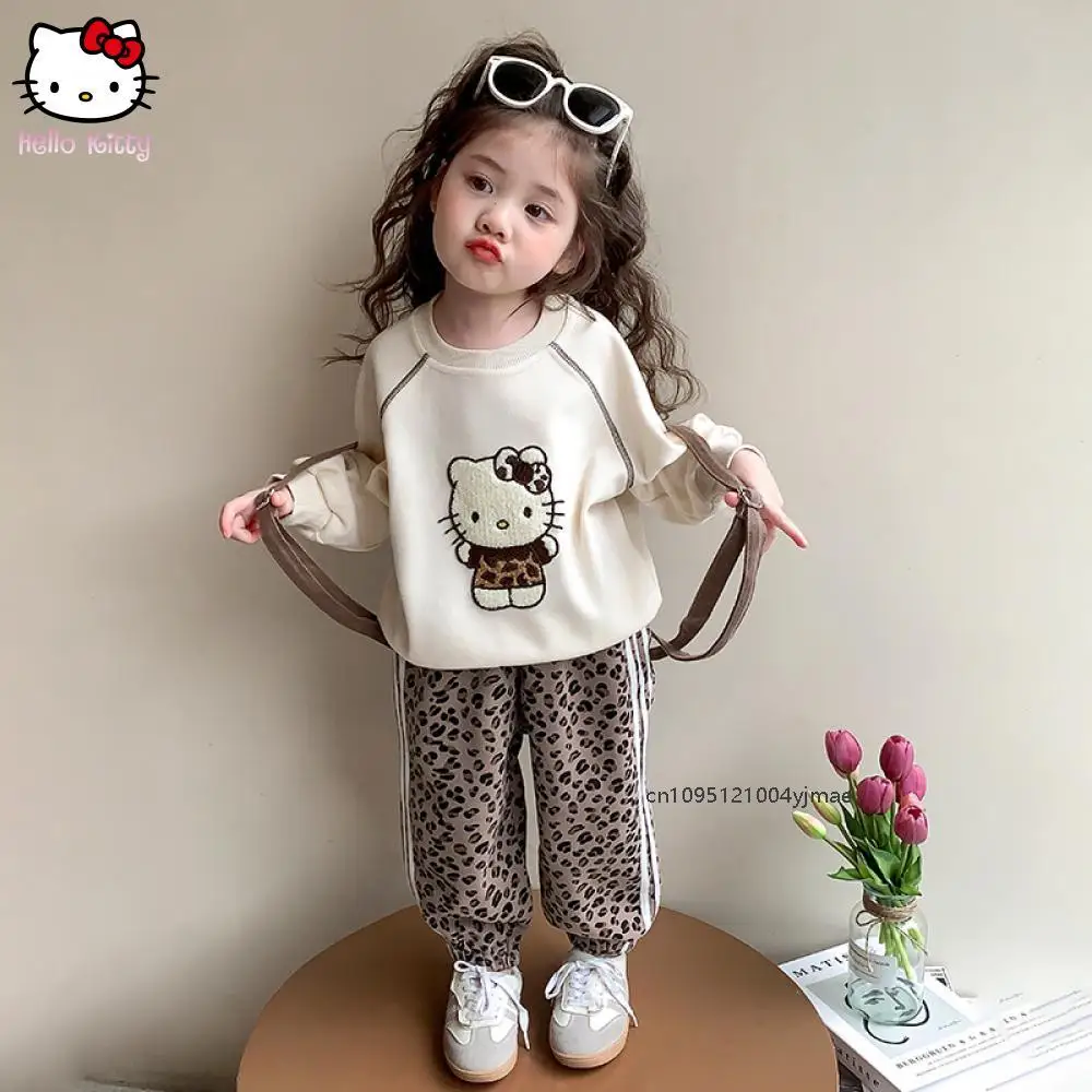 

Sanrio Hello Kitty, комплект с капюшоном с леопардовым принтом для девочек, весенний новый модный пуловер с героями мультфильмов, брюки, милые топы, детская одежда Kawaii