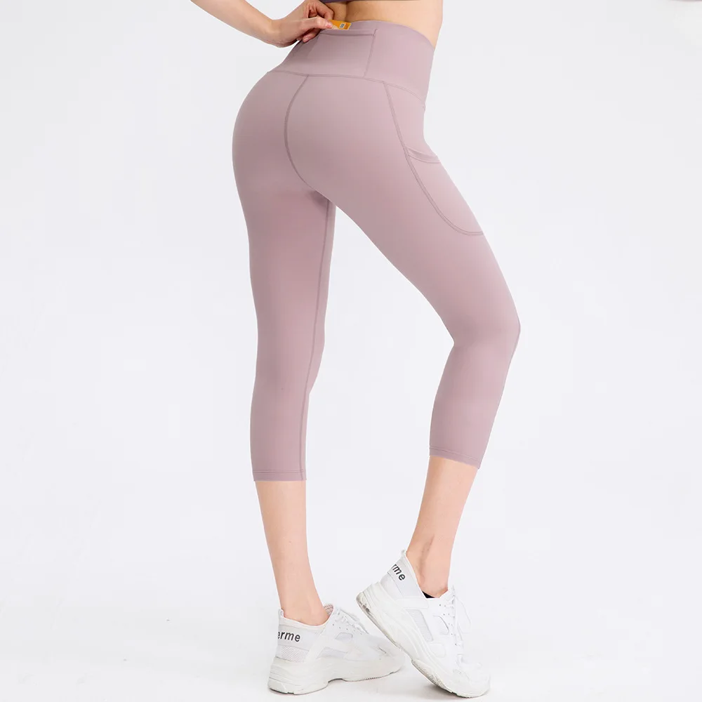 Pantalones deportivos para mujer, pantalones de Yoga con bolsillo, elásticos, ajustados, para levantar la cadera, gimnasio seco, pantalones deportivos para correr, pantalones recortados S-XXL