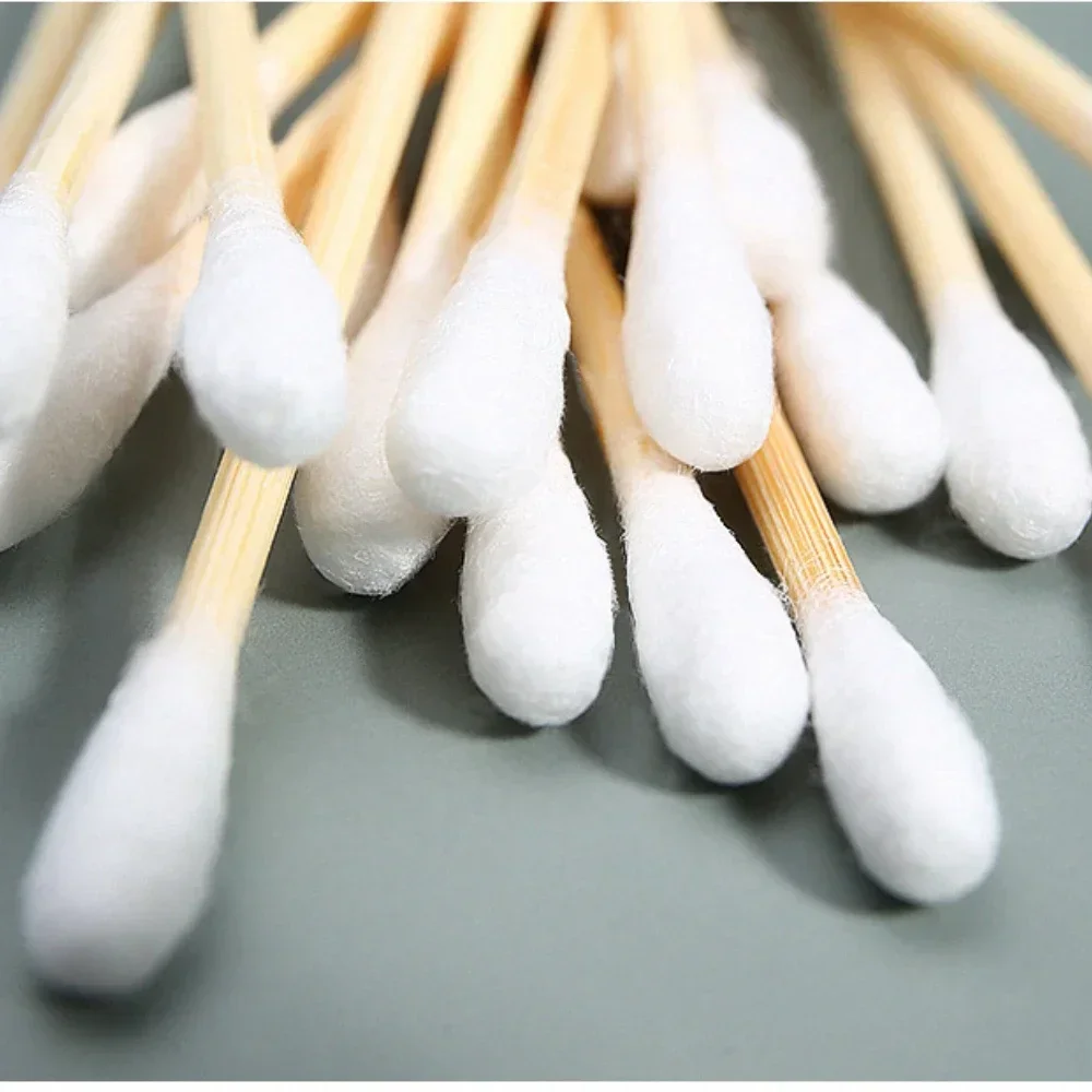 100 unids/lote hisopos de algodón de doble cabeza limpieza de nariz y oídos mujeres maquillaje punta de bastoncillos de algodón para palos de madera herramientas de cuidado de la salud gran oferta