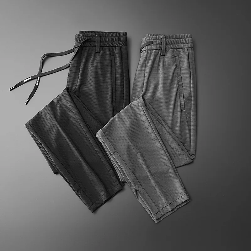 Pantalones informales finos de seda de hielo para hombre, ropa deportiva holgada de secado rápido con bolsillos con cremallera, color negro, para verano