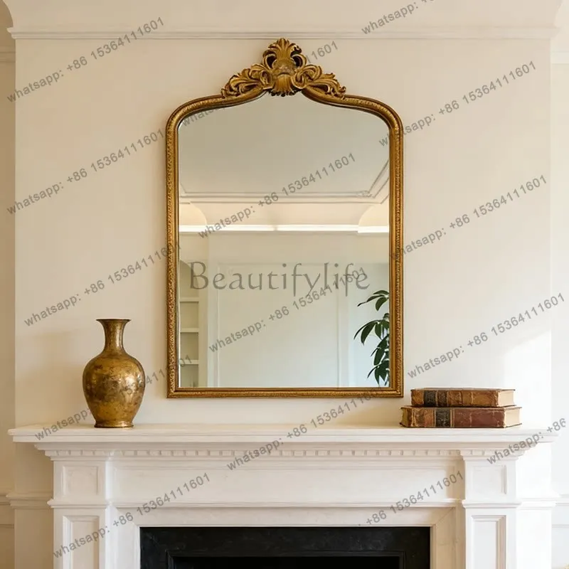 French vintage entryway, carved fireplace, above decorative mirror, washbasin, vanity mirror