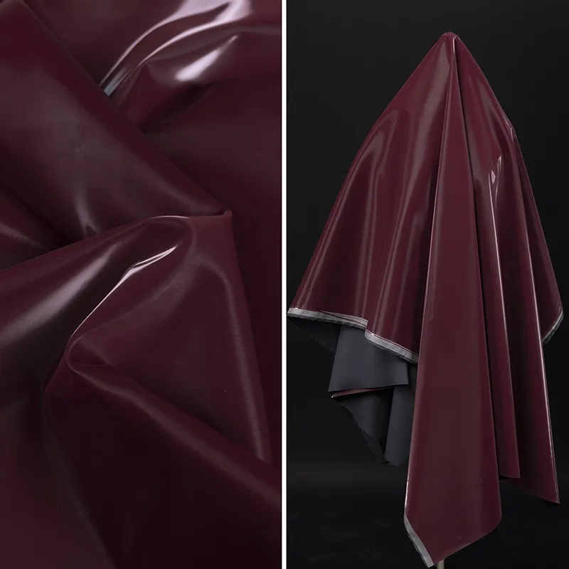 

High-gloss wine-red leather fabric washable mirror surface wide wear-resistant and smooth artificial for clothing