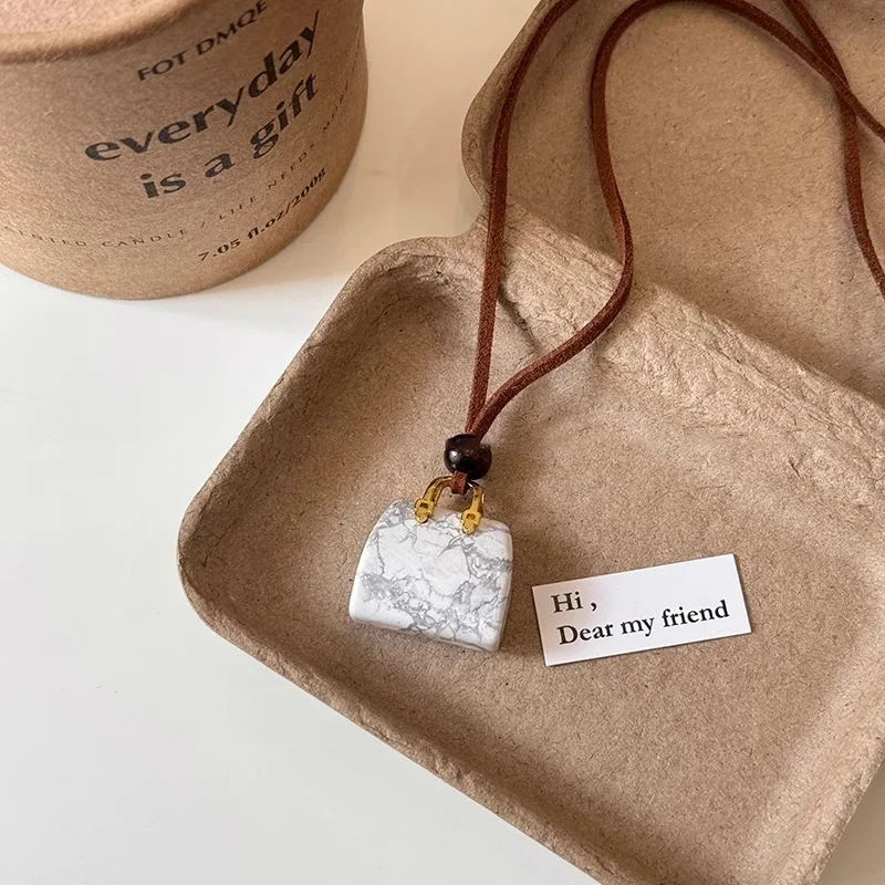 Vintage Cute Small Stone Bag Pendant Long Necklace for Women Korean Velvet Sweater Chain Jewelry Versatile Hanging Accessory