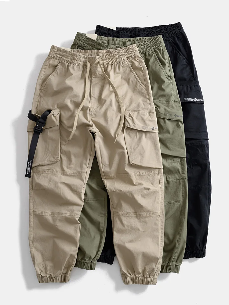 

Весенние японские свободные широкие брюки с манжетами в стиле ретро, мужские повседневные брюки с несколькими карманами и слегка эластичной резинкой на талии, модные
