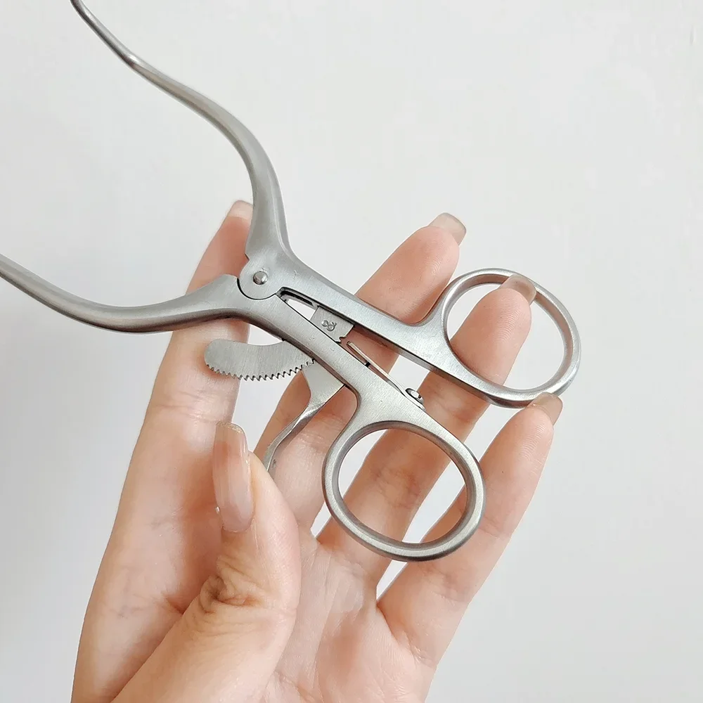 Automatic fixed position adjustable stainless steel orthopedic surgical instrument for pets