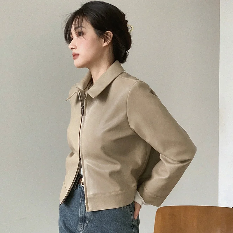 シックなヴィンテージ風PUレザージャケット、長袖、ゆったりフィット、ジッパー襟デザイン、多用途アウターウェア、女性用通勤スタイル