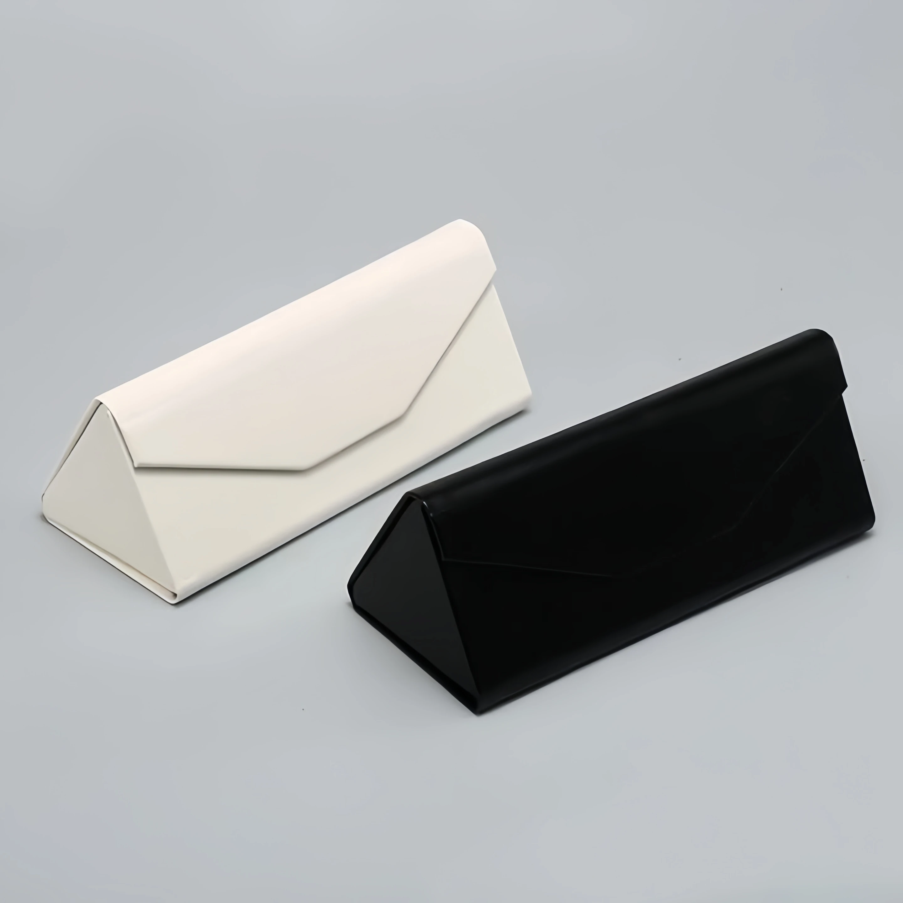 

Fashionable and High-End Glasses Storage Box Can Hold Various Glasses Pressure-Resistant Triangular Folding Glasses Cases