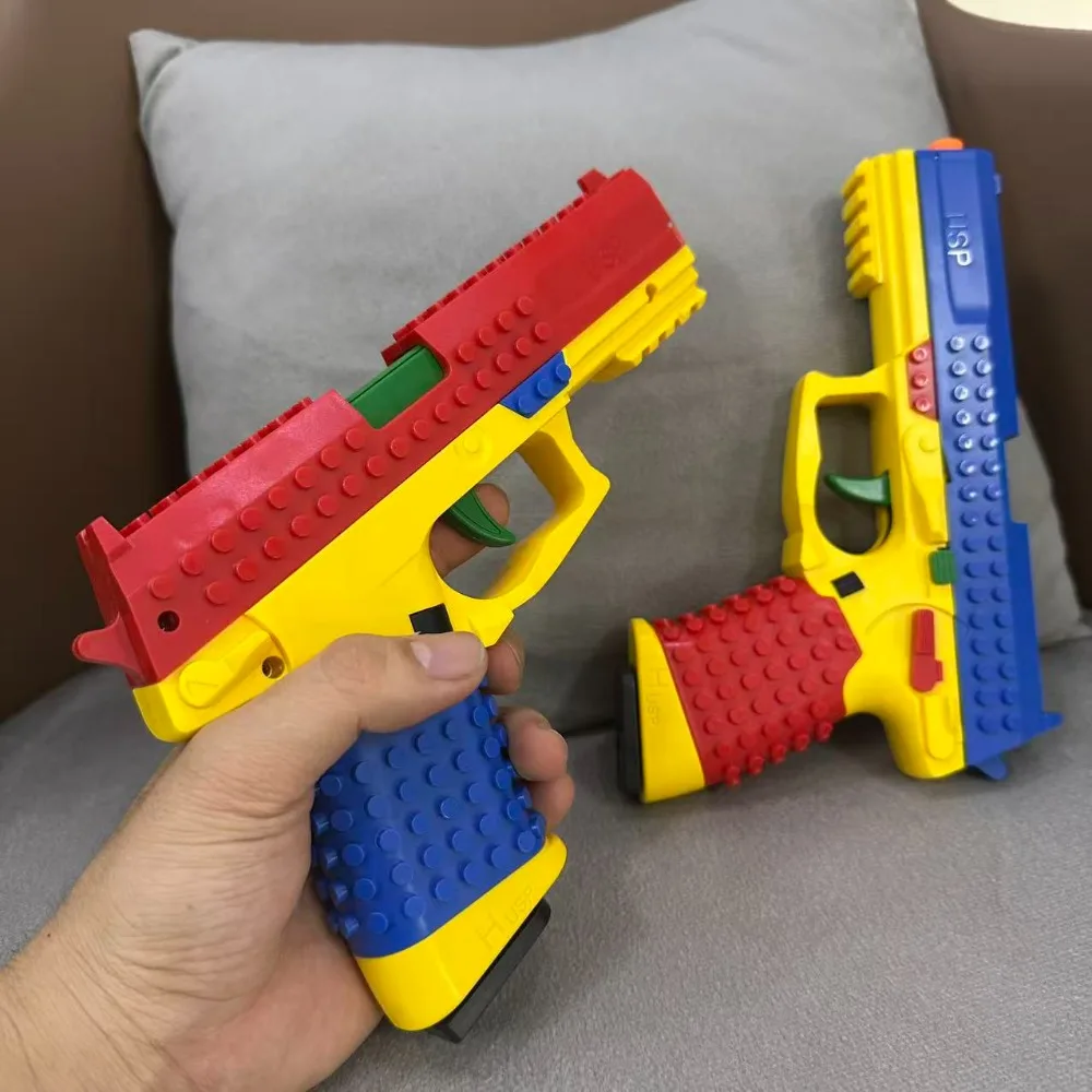 2026 Building Block Pistol-shaped Assembly Toy with Continuous Firing & Shell Ejection Feature for Interactive Outdoor Play