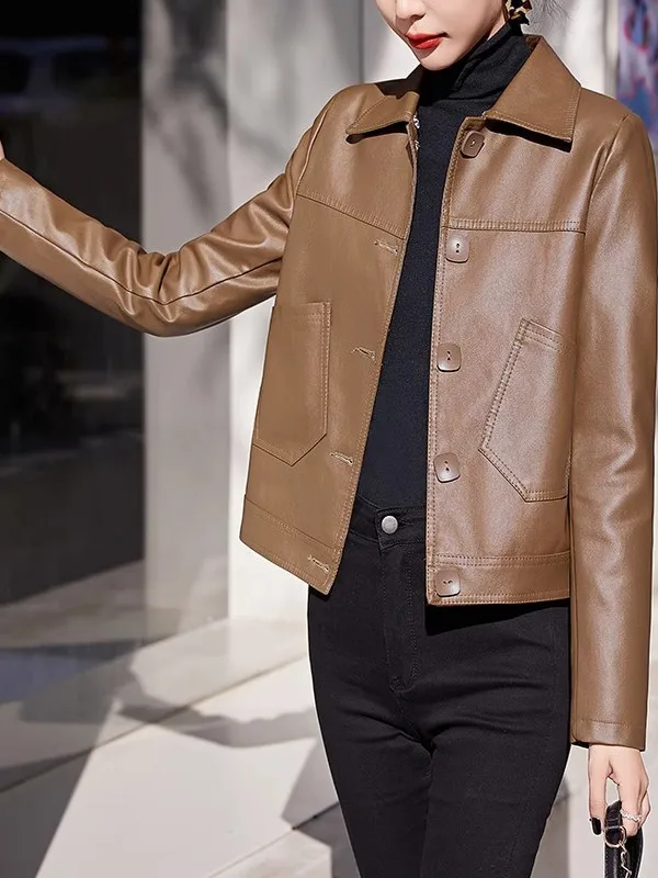 عارضة السائق الجلود Jaet حجم صغير ربيع الخريف منفذ العلامة التجارية المرأة فضفاضة تناسب بو الجلود طويلة Sve زر مزين