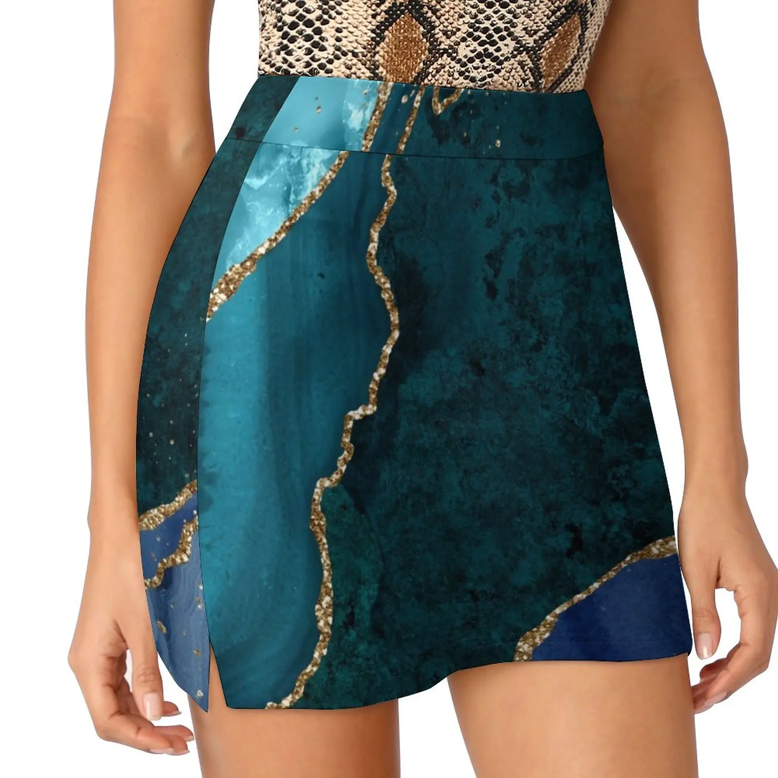 Blue and teal colors, peacock colors, agate stone effect with gold accents, striking and colorful Light proof trouser skirt