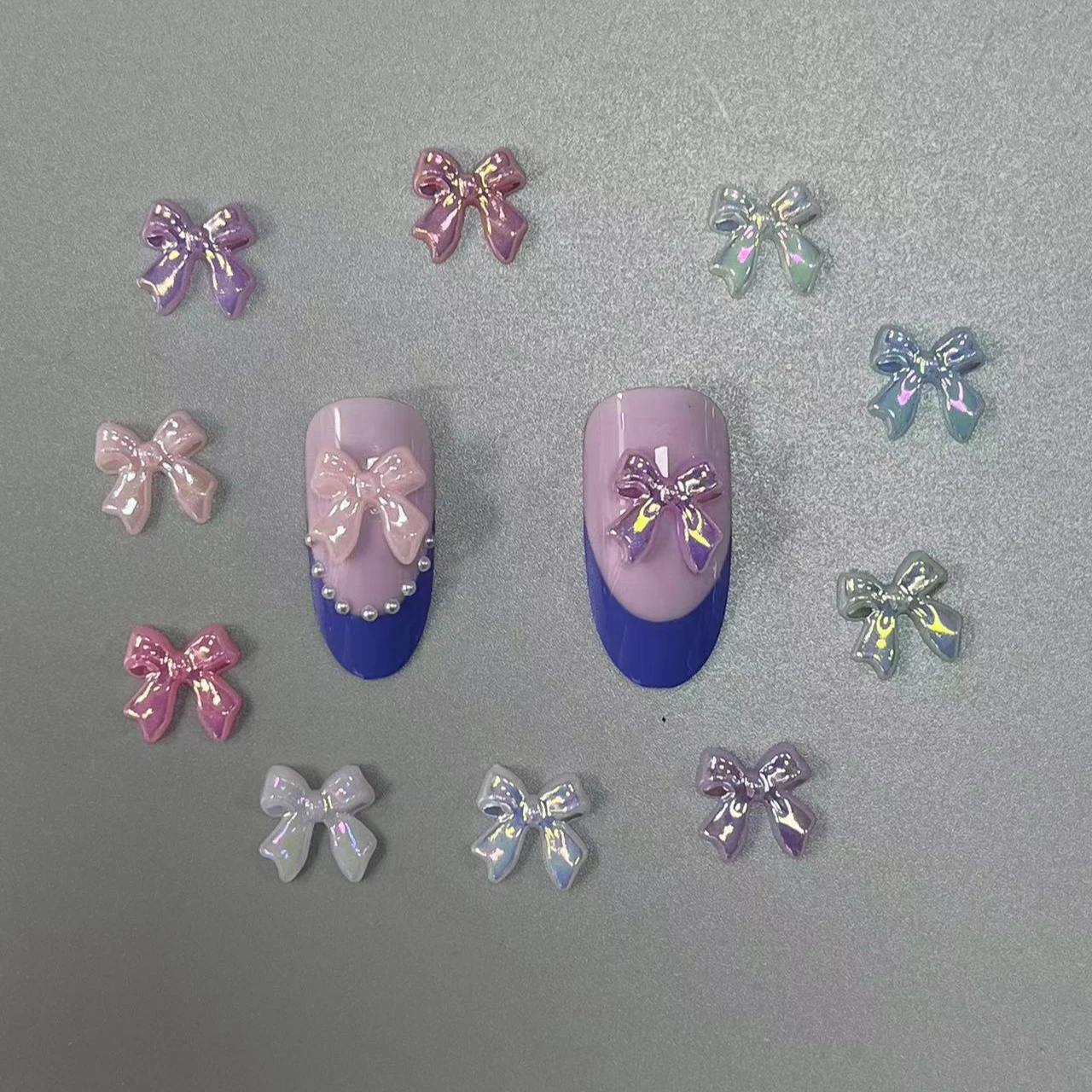 100PCS/Bag Bow Knot AB Colorful Resin Nail Art Decoration Accessories Charms 3D Kawaii 11*11MM Ribbon Nail Jewelry Gems