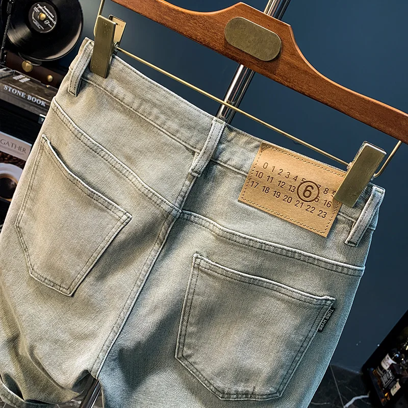 American Denim Shorts Herren Sommer neue Street Fashion gerade dünne lässige gelbe Schlamm gefärbte ausgewaschene Vintage kurze Hosen