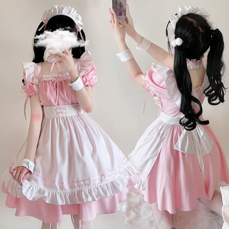 

Sakura Fantasy Maid Set Blush Pink Tiered Lolita Dress with Bows Kawaii Anime Cafe Uniform for Seasonal Cosplay Events Hallowee