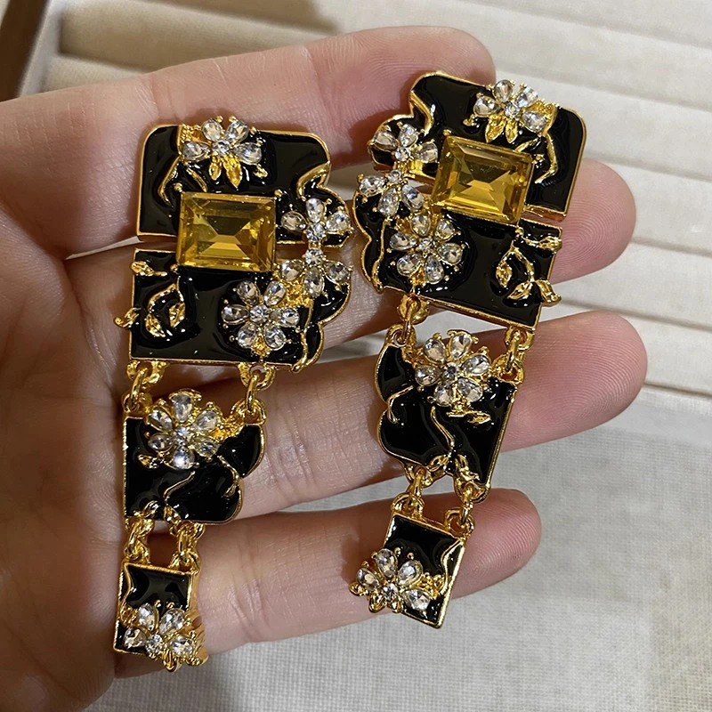 

Charming geometric design floral asymmetric earrings, travel and vacation jewelry