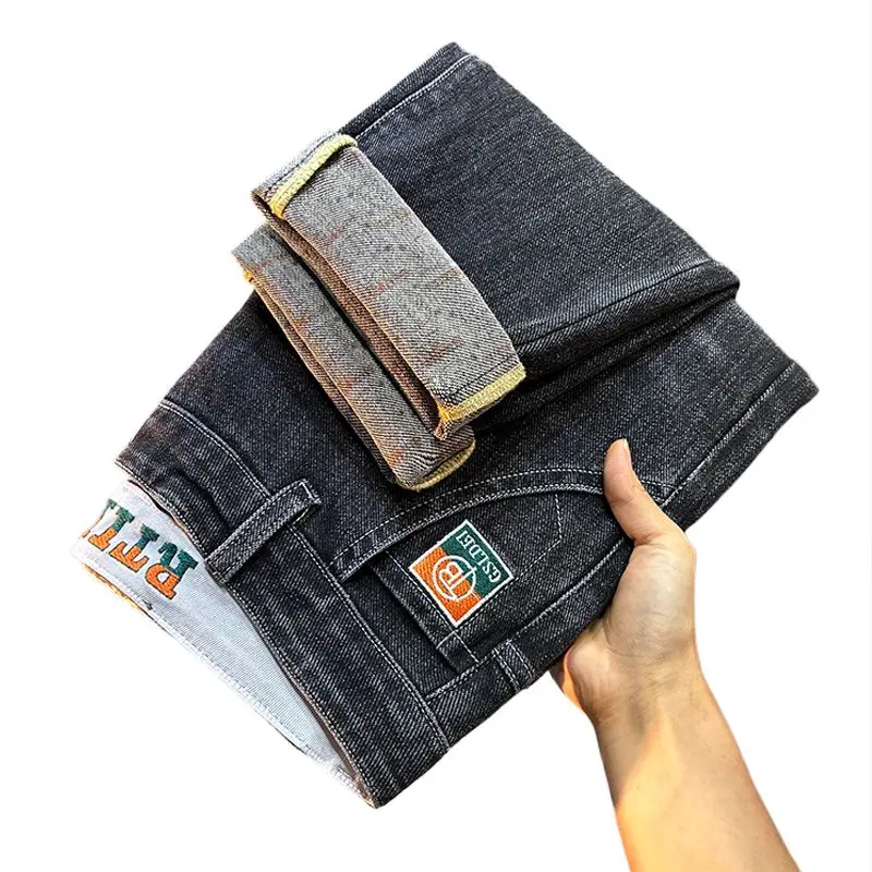 بنطال جينز رجالي من القطن المرن مستقيم وناعم ومريح من قماش الدنيم غير رسمي موضة الخريف بنطلون عمل كوري