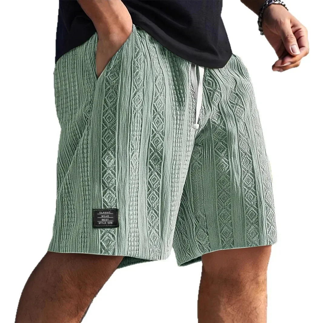 Pantaloni corti da uomo comodi e casual Texture Logo della moda Pantaloncini da spiaggia per uso quotidiano Pantaloncini estivi per il tempo libero da uomo con fantasia elegante