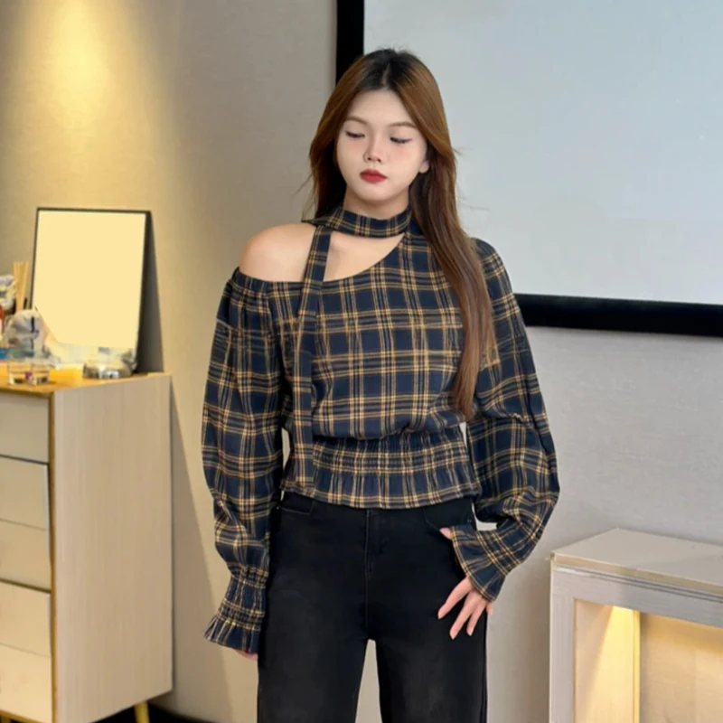 2025 Otoño e Invierno nueva camisa de manga larga con hombros oblicuos irregulares Top de cintura a cuadros Retro para mujer