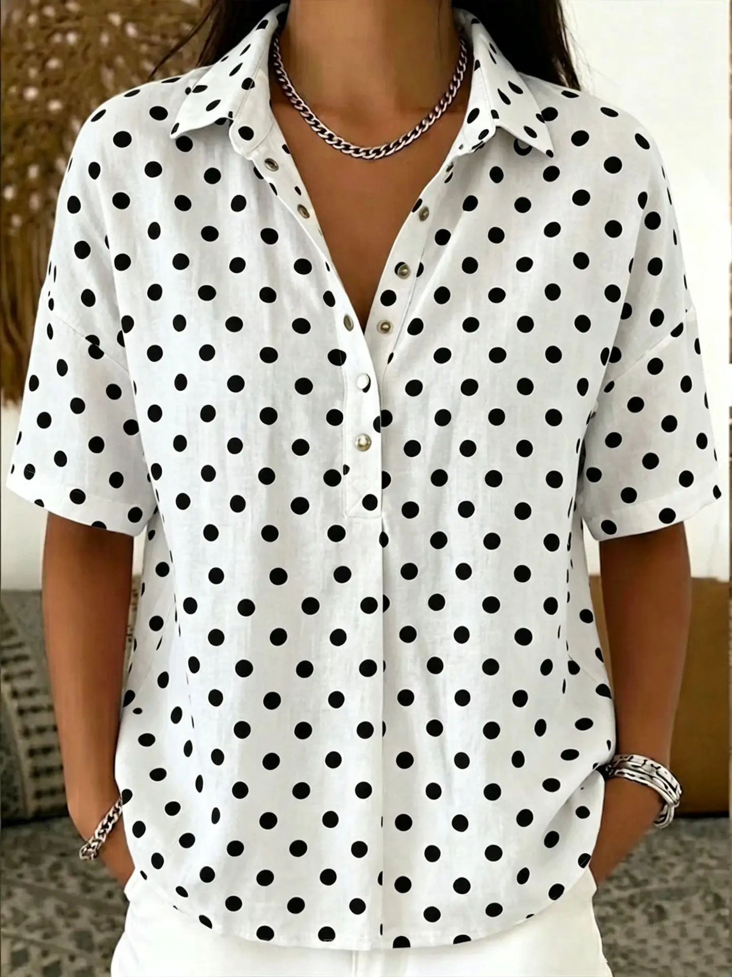 New style casual polka dot button-up collar shirt with semi-open fastening for women.