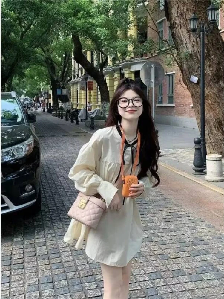 Abito francese vintage con maniche a palloncino Girly rilassato girocollo con fiocco e abito a trapezio smock Gonna silhouette mini bambola tono tè alla moda