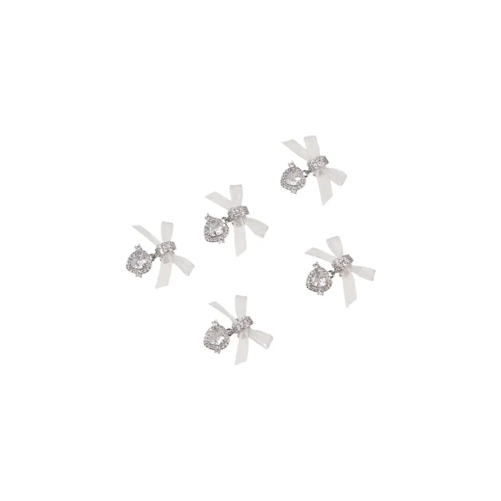 1 個マニキュア装飾品ジルコンネイルアートアクセサリーオーガンザリボン絶妙なハートジルコンペンダントネイルチャーム光沢のある金属