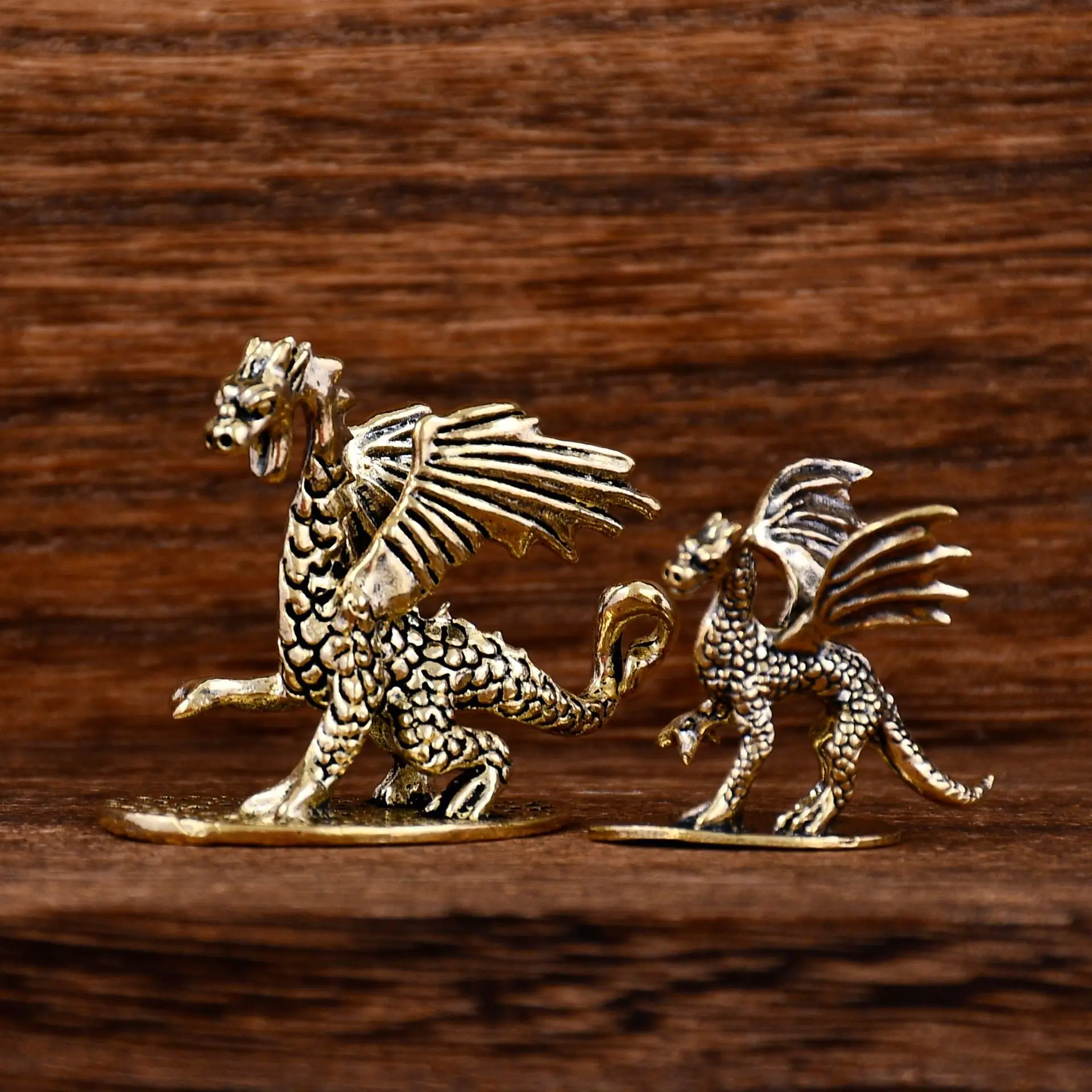A powerful magic dragon little flying dragon brass figurine, aged ancient copper micro-carved tea pet small figurine