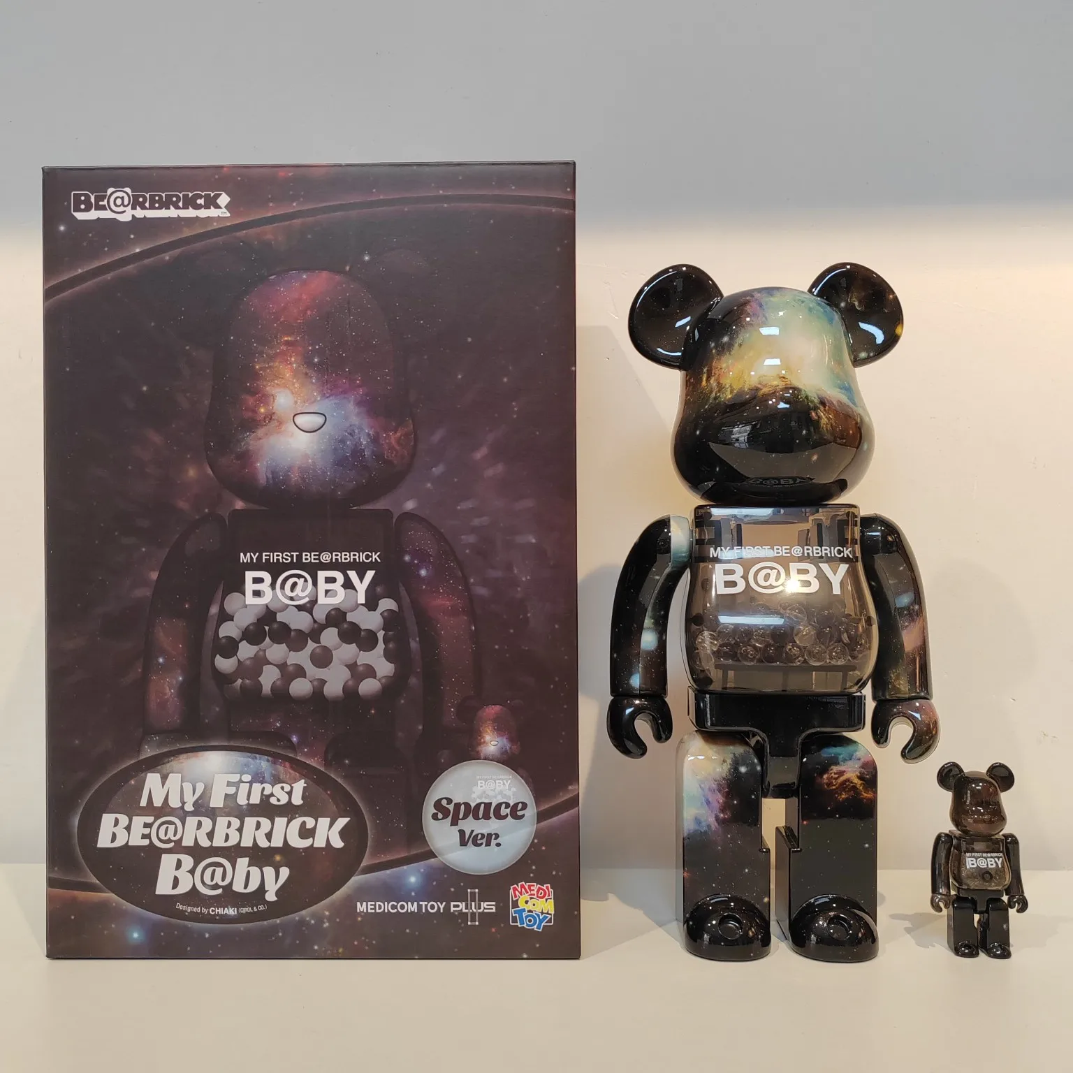 

Bearbrick 400% and 100% Space Star Premium Edition Brick Bear Collection Gift Doll contains two figures one large and one small