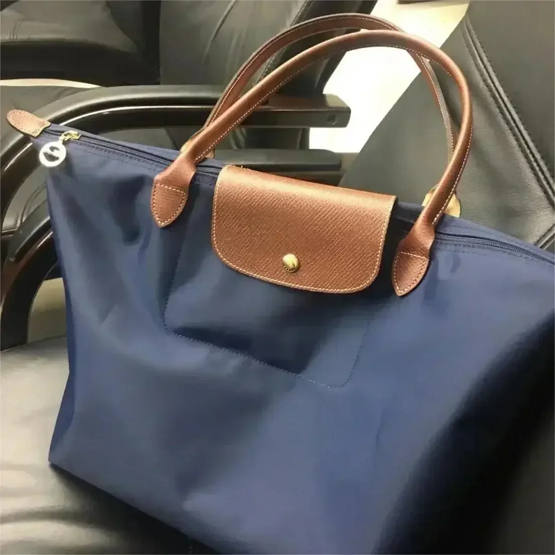 Bolso de hombro informal plegable de diseñador para mujer, bolsos de nailon de alta calidad, bolso de mano clásico de gran capacidad, novedad de 2024