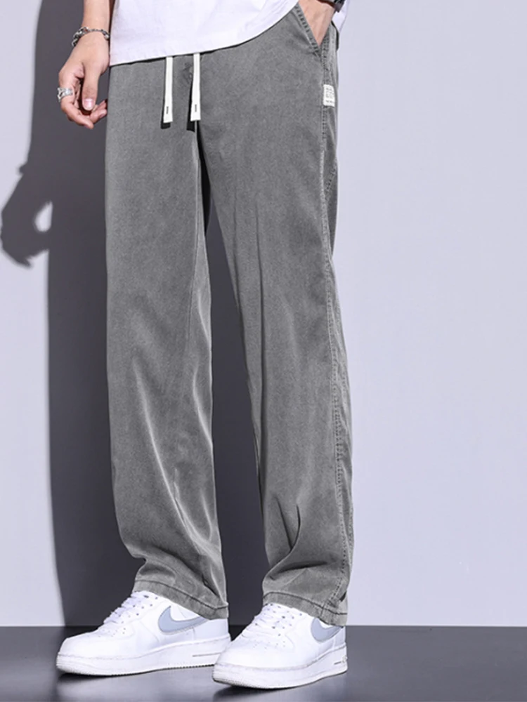 Pantaloni estivi da uomo morbidi e sottili larghi dritti a gamba larga Pantaloni popolari in tessuto Lyocell allentato coreano con coulisse in vita elastica
