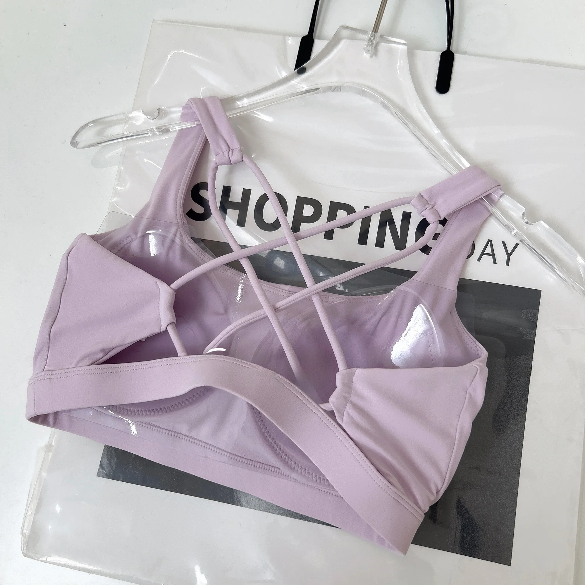 

Спортивный бюстгальтер женский, бесшовный, с красивой перекрестной спинкой, для бега и пилатеса, из нейлоновой ткани, для занятий спортом.