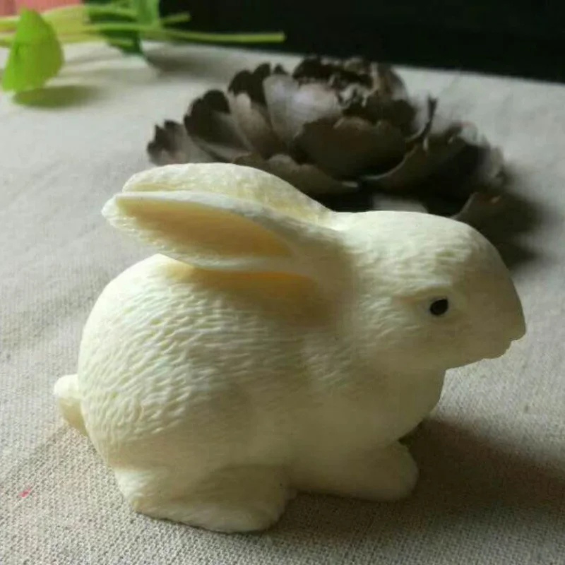 

Ivory Nut Carving Jade Hare Hand Pieces Table Small Ornaments Tea Ornaments Zodiac Bunny Car Decoration Small Gift Box