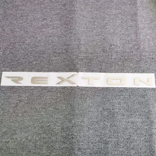 Imagen 2 del producto Emblema del logotipo de la puerta trasera del maletero genuino para Ssangyong REXTON 2006-2012 insignia del logotipo de la tapa del maletero trasero 7991008020 Señal del parachoques trasero