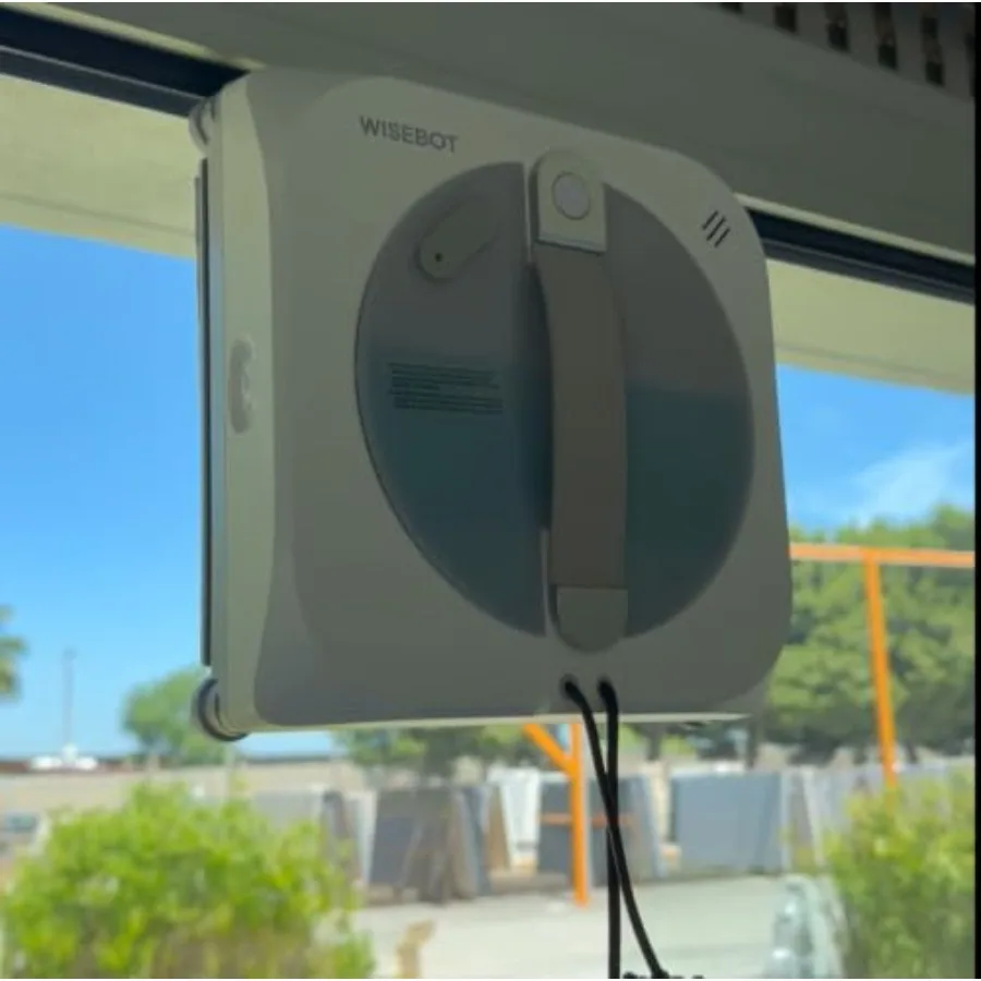 Window Cleaning Robot for home and office use, ABS plastic body, black color, AI navigation and triple spray for efficient dust